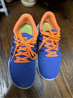 Nike Women’s Bright Blue Sneakers with Orange Laces